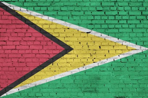 Гайянський Прапор Намалював Старий Цегляна Стіна — стокове фото