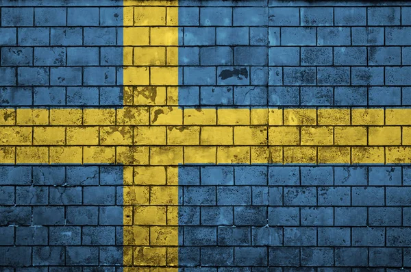 Švédská Vlajka Vymalována Starou Cihlovou Zeď — Stock fotografie