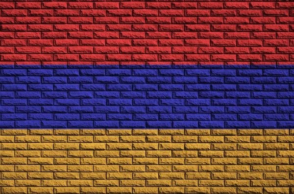 亚美尼亚国旗涂在一面古老的砖墙上 — 图库照片