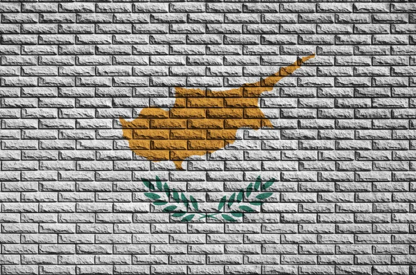 Cyprus flag is painted onto an old brick wall