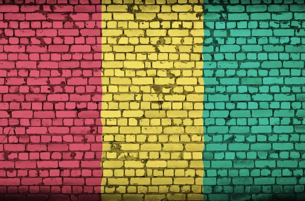 Прапор Гвінеї Намалював Старий Цегляна Стіна — стокове фото