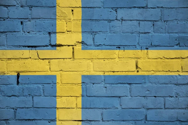 Švédská Vlajka Vymalována Starou Cihlovou Zeď — Stock fotografie