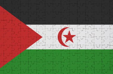 Batı Sahra bayrak katlanmış bir bulmaca tasvir