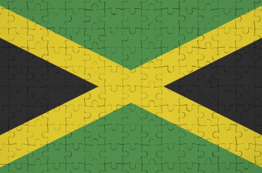 Jamaika bayrağını katlanmış bir bulmaca tasvir