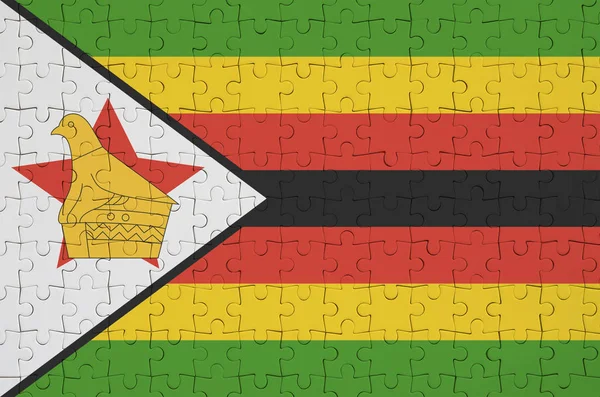 Zimbabwe Bandiera Raffigurato Puzzle Piegato — Foto Stock