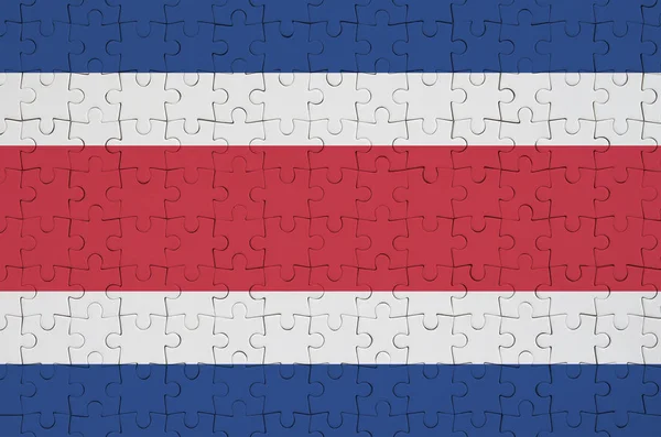 Flaga Kostaryki Jest Przedstawiony Składane Puzzle — Zdjęcie stockowe