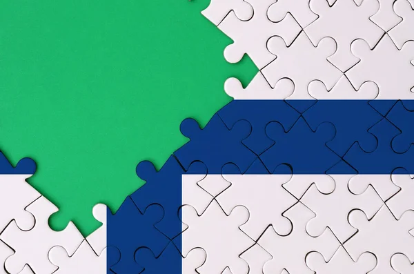 Finlandia Bandiera Raffigurato Puzzle Completato Con Spazio Libero Copia Verde — Foto Stock