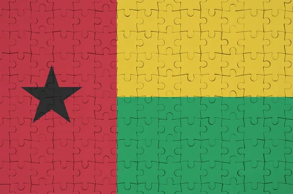 Die Flagge Von Guinea Bissau Ist Auf Einem Gefalteten Puzzle — Stockfoto