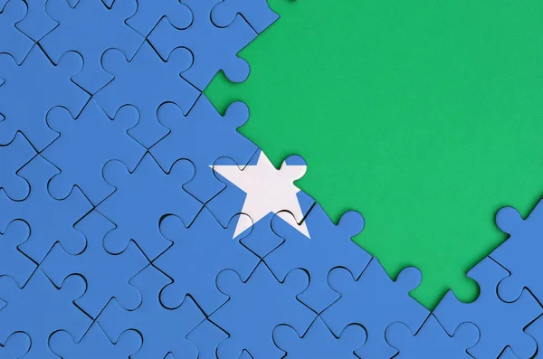 Bandiera Somalia Raffigurato Puzzle Completato Con Spazio Libero Copia Verde — Foto Stock