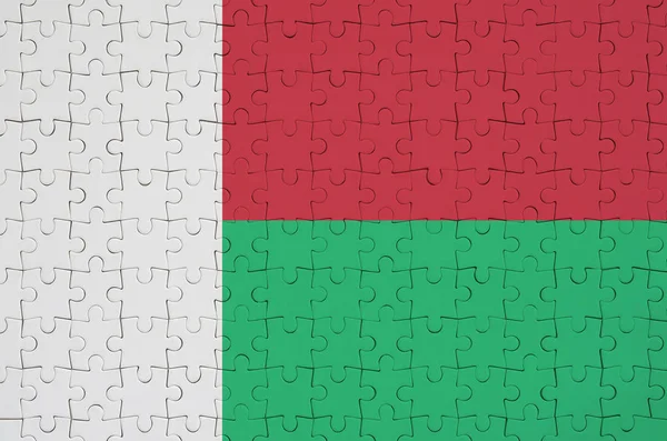 Flaga Madagaskaru Jest Przedstawiony Składane Puzzle — Zdjęcie stockowe