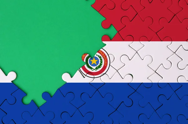 巴拉圭国旗描绘在一个完整的拼图与自由的绿色复制空间左侧 — 图库照片