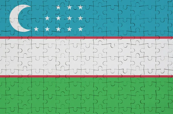 Uzbekistan Flag Depicted Folded Puzzle — Stock Photo, Image