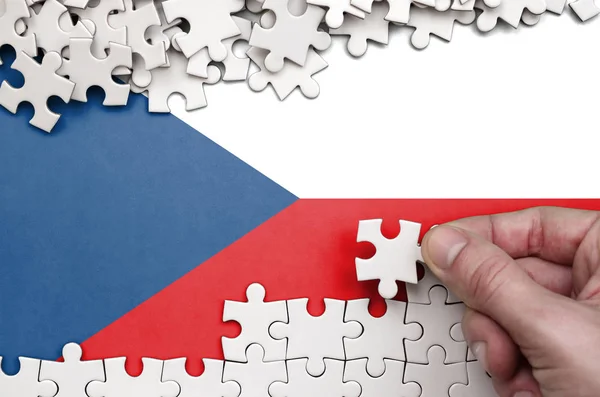 Czech Flag Depicted Table Which Human Hand Folds Puzzle White — Stock Photo, Image