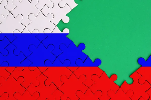 Russia Flag Depicted Completed Jigsaw Puzzle Free Green Copy Space — Stock Photo, Image