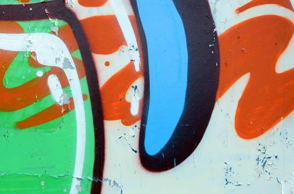 Sokak sanatı. Haki yeşil ve turuncu tonlarında renkli grafiti resmi bir parçasının arka plan görüntü.