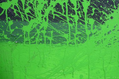 Sokak sanatı. Haki yeşil ve turuncu tonlarında renkli grafiti resmi bir parçasının arka plan görüntü.