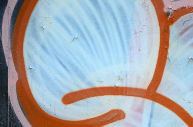 Sokak sanatı. Beyaz ve turuncu tonlarında renkli grafiti resmi bir parçasının arka plan görüntü.