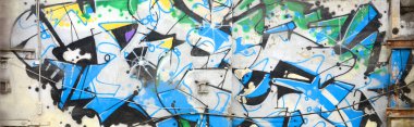 Sokak sanatı. Krom ve mavi tonlarda tam tamamlanan grafiti resminin arka plan görüntü.