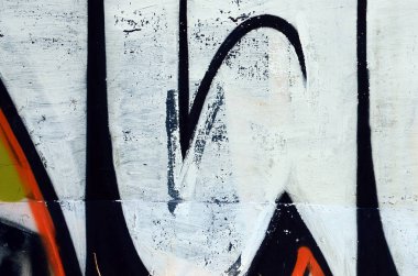 Sokak sanatı. Beyaz ve turuncu tonlarında renkli grafiti resmi bir parçasının arka plan görüntü.