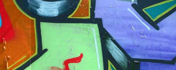街头艺术 彩色涂鸦画片断的背景图片在卡其色的绿色和橙色口气 — 图库照片