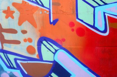 Sokak sanatı. Bej ve turuncu tonlarında renkli grafiti resmi bir parçasının arka plan görüntü.