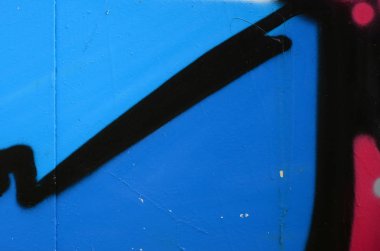 Sokak sanatı. Renkli grafiti resmi bulunan bir rahiplik mavi tonları bir arka plan görüntüsü.