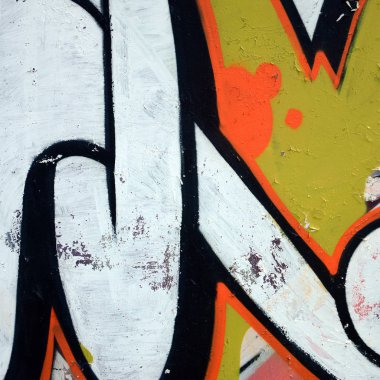 Sokak sanatı. Beyaz ve turuncu tonlarında renkli grafiti resmi bir parçasının arka plan görüntü.