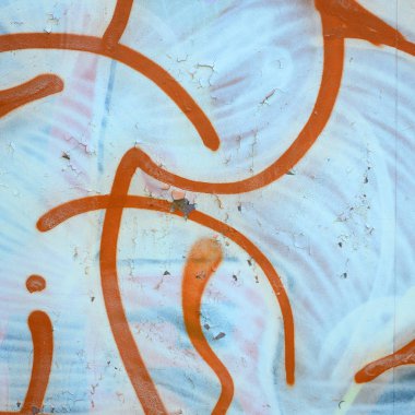 Sokak sanatı. Beyaz ve turuncu tonlarında renkli grafiti resmi bir parçasının arka plan görüntü.