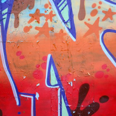Sokak sanatı. Bej ve turuncu tonlarında renkli grafiti resmi bir parçasının arka plan görüntü.