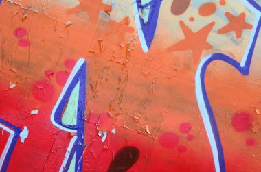 Sokak sanatı. Bej ve turuncu tonlarında renkli grafiti resmi bir parçasının arka plan görüntü.