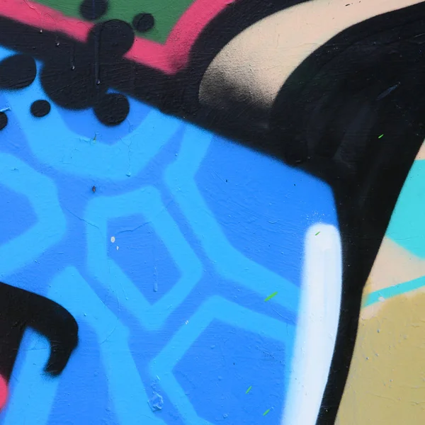 街头艺术 彩色涂鸦画片断的背景图片在蓝色口气 — 图库照片