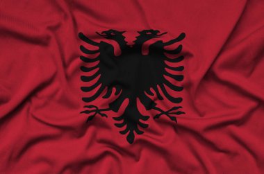  Arnavutluk bayrağı ile birçok çiziklere spor bez kumaş üzerinde tasvir edilmiştir. Spor takım sallayarak afiş