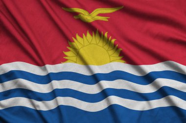 Kiribati bayrağı ile birçok çiziklere spor bez kumaş üzerinde tasvir edilmiştir. Spor takım sallayarak afiş