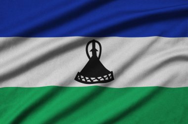 Lesoto bayrağı ile birçok çiziklere spor bez kumaş üzerinde tasvir edilmiştir. Spor takım sallayarak afiş