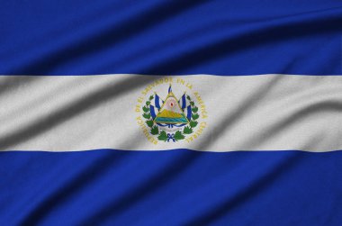 El Salvador bayrağı ile birçok çiziklere spor bez kumaş üzerinde tasvir edilmiştir. Spor takım sallayarak afiş