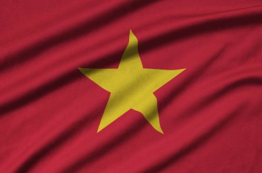 Vietnam bayrağı ile birçok çiziklere spor bez kumaş üzerinde tasvir edilmiştir. Spor takım sallayarak afiş