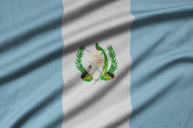 Guatemala bayrağı ile birçok çiziklere spor bez kumaş üzerinde tasvir edilmiştir. Spor takım sallayarak afiş