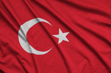 Türkiye bayrağı ile birçok çiziklere spor bez kumaş üzerinde tasvir edilmiştir. Spor takım sallayarak afiş