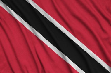 Trinidad ve Tobago bayrağı ile birçok çiziklere spor bez kumaş üzerinde tasvir edilmiştir. Spor takım sallayarak afiş