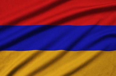 Ermenistan bayrağı ile birçok çiziklere spor bez kumaş üzerinde tasvir edilmiştir. Spor takım sallayarak afiş