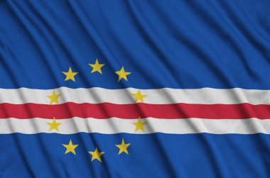 Cabo verde bayrağı ile birçok çiziklere spor bez kumaş üzerinde tasvir edilmiştir. Spor takım sallayarak afiş