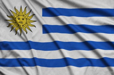 Uruguay bayrağı ile birçok çiziklere spor bez kumaş üzerinde tasvir edilmiştir. Spor takım sallayarak afiş