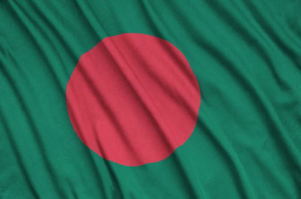 Bandeira Bangladesh Representado Tecido Pano Esportes Com Muitas Dobras Esporte — Fotografia de Stock