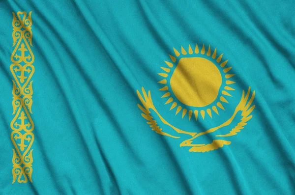 Flaga Kazachstanu Jest Przedstawiony Materiał Tkaniny Sportowe Dużo Chętnych Transparent — Zdjęcie stockowe