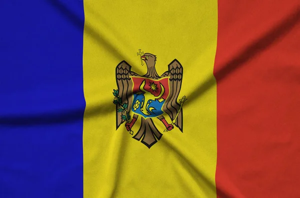 Moldavsko Vlajka Zobrazen Sportovní Tkanina Tkaniny Mnoha Záhyby Sportovní Tým — Stock fotografie