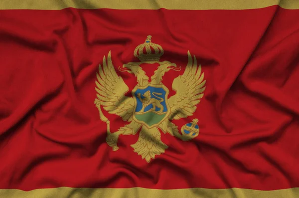 Vlajka Černé Hory Zobrazen Sportovní Tkanina Tkaniny Mnoha Záhyby Sportovní — Stock fotografie