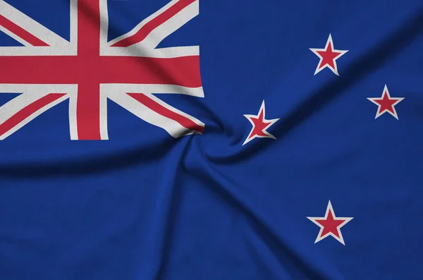 Yeni Zelanda Bayrağı Ile Birçok Çiziklere Spor Bez Kumaş Üzerinde — Stok fotoğraf