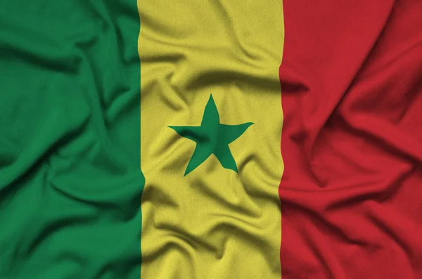 Die Senegalesische Flagge Ist Auf Einem Sportstoff Mit Vielen Falten — Stockfoto