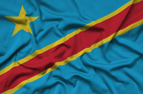 刚果民主共和国国旗被描绘成有许多褶皱的运动布织物 运动队挥舞旗帜 — 图库照片