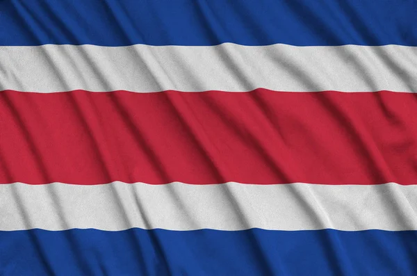 Flaga Kostaryki Jest Przedstawiony Materiał Tkaniny Sportowe Dużo Chętnych Transparent — Zdjęcie stockowe